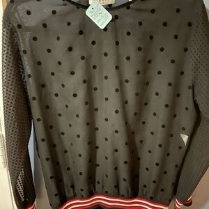 Sandro crew neck blouse size 1
Sheer with velvet poka dots
Excellent condition